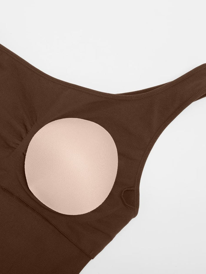 Shaping Jumpsuit med Snedskurna Axelband och Utsvängda Ben